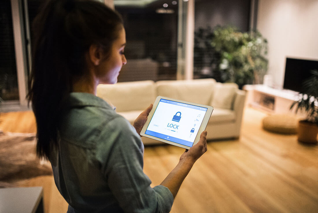 woman looking at security app