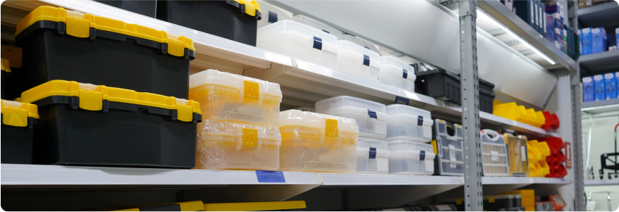 Many storage bins with labels.